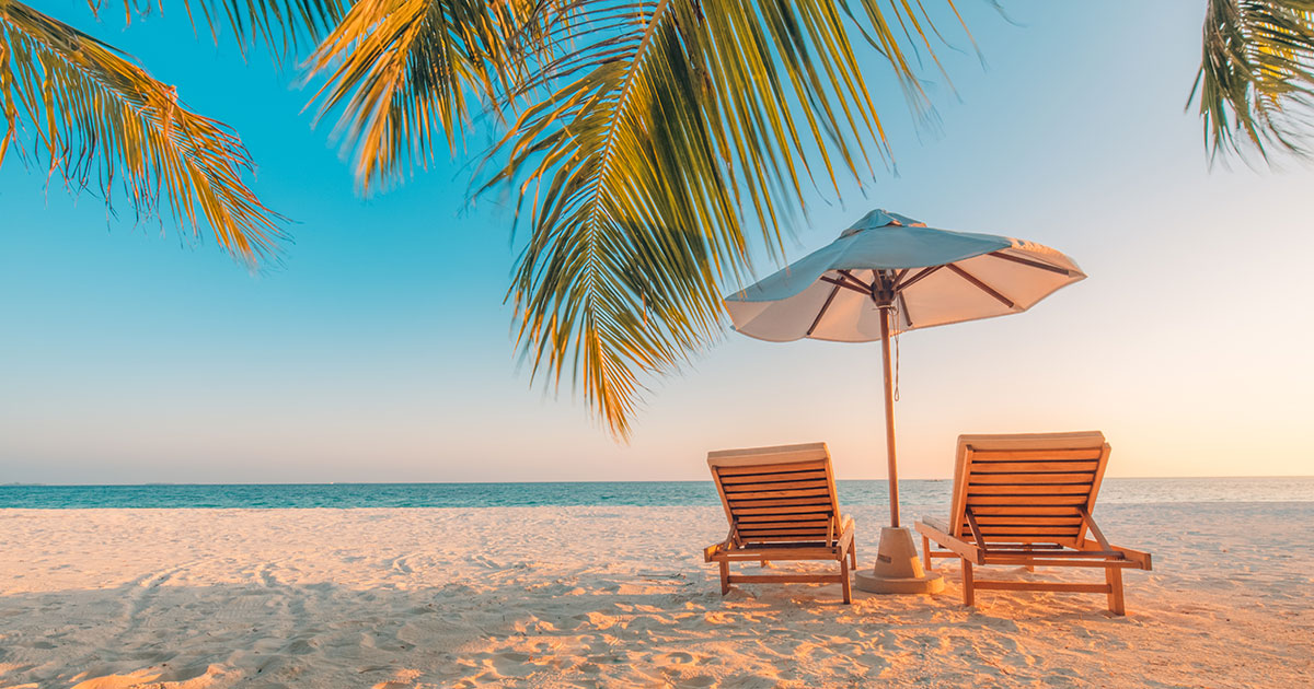 Two chairs on a beach